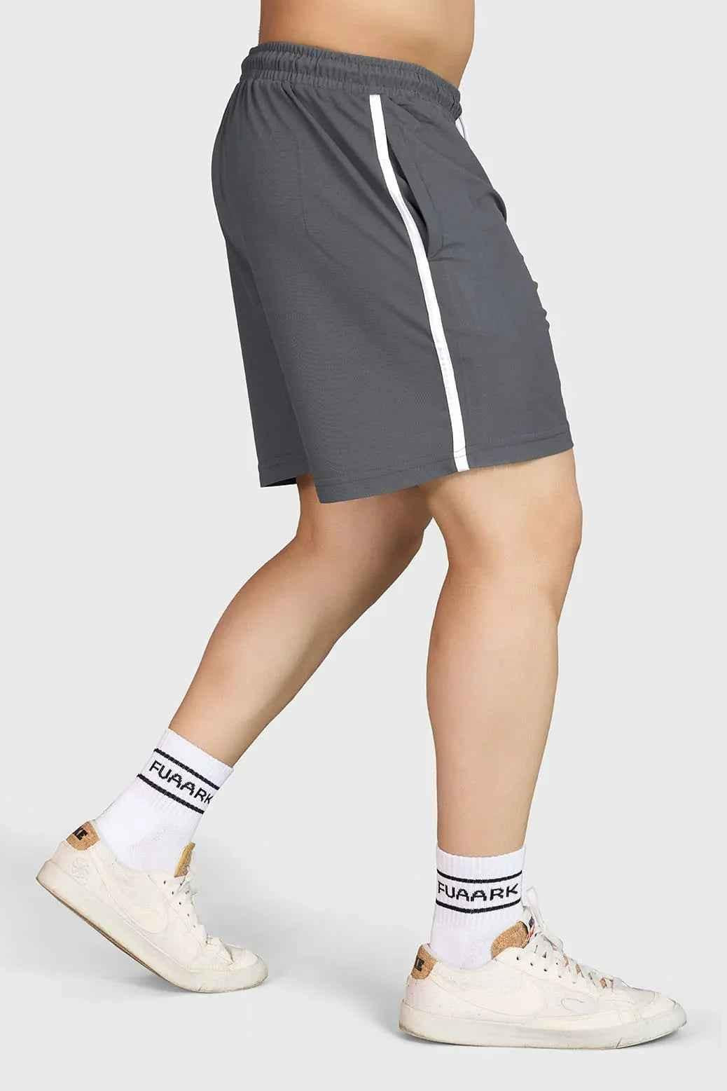 Fuaark Nz Grit Shorts in grey laid flat, showing lightweight fabric and casual design for outdoor or everyday wear.
