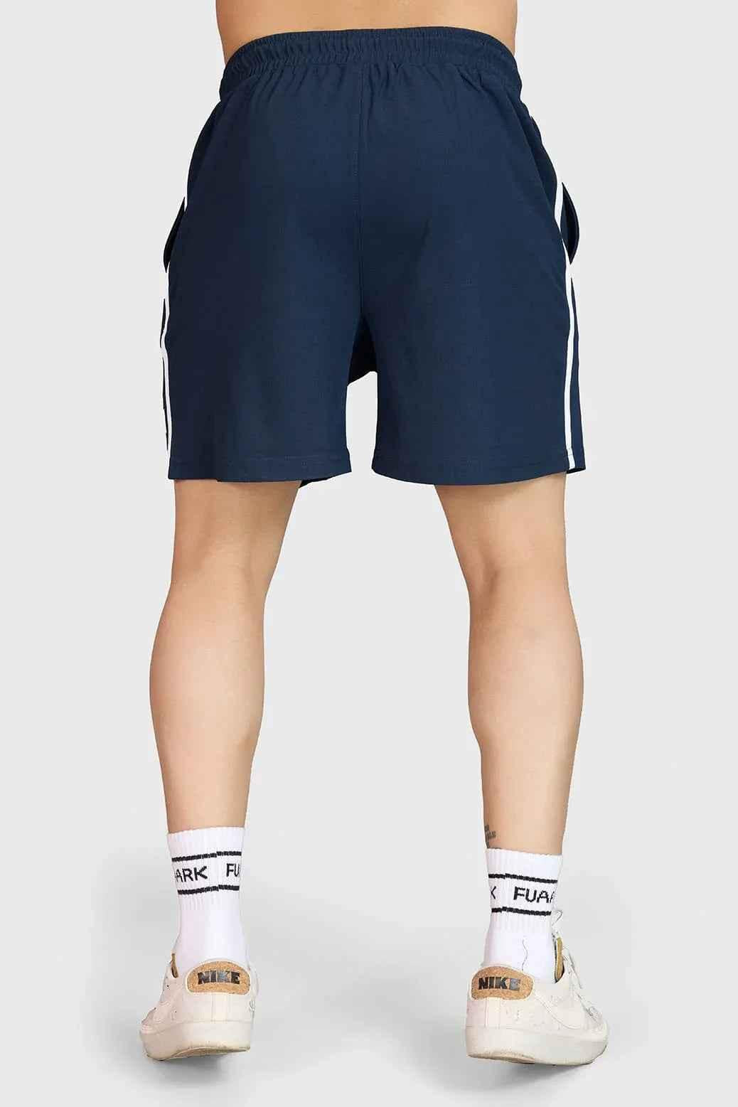 Fuaark Nz Grit Shorts in navy color, casual men's shorts with a relaxed fit and durable fabric for outdoor activities.