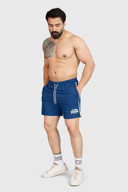 Fuaark Nz Grit Shorts Orion Blue displayed on a model, showcasing the sporty design and vibrant blue color.