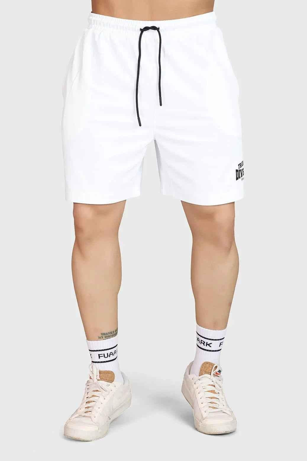 White Grit Shorts by Fuaark NZ, casual men's shorts with a sporty design and comfortable fit, shown on a model.
