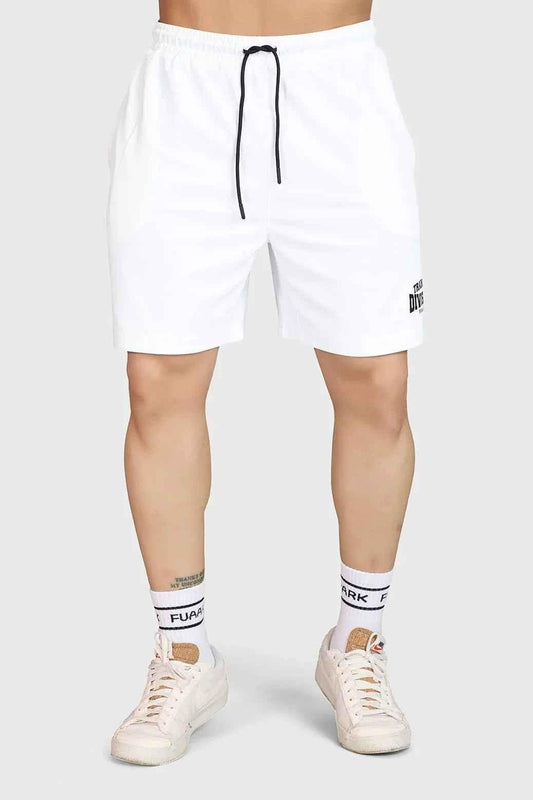 White Grit Shorts by Fuaark NZ, casual men's shorts with a sporty design and comfortable fit, shown on a model.
