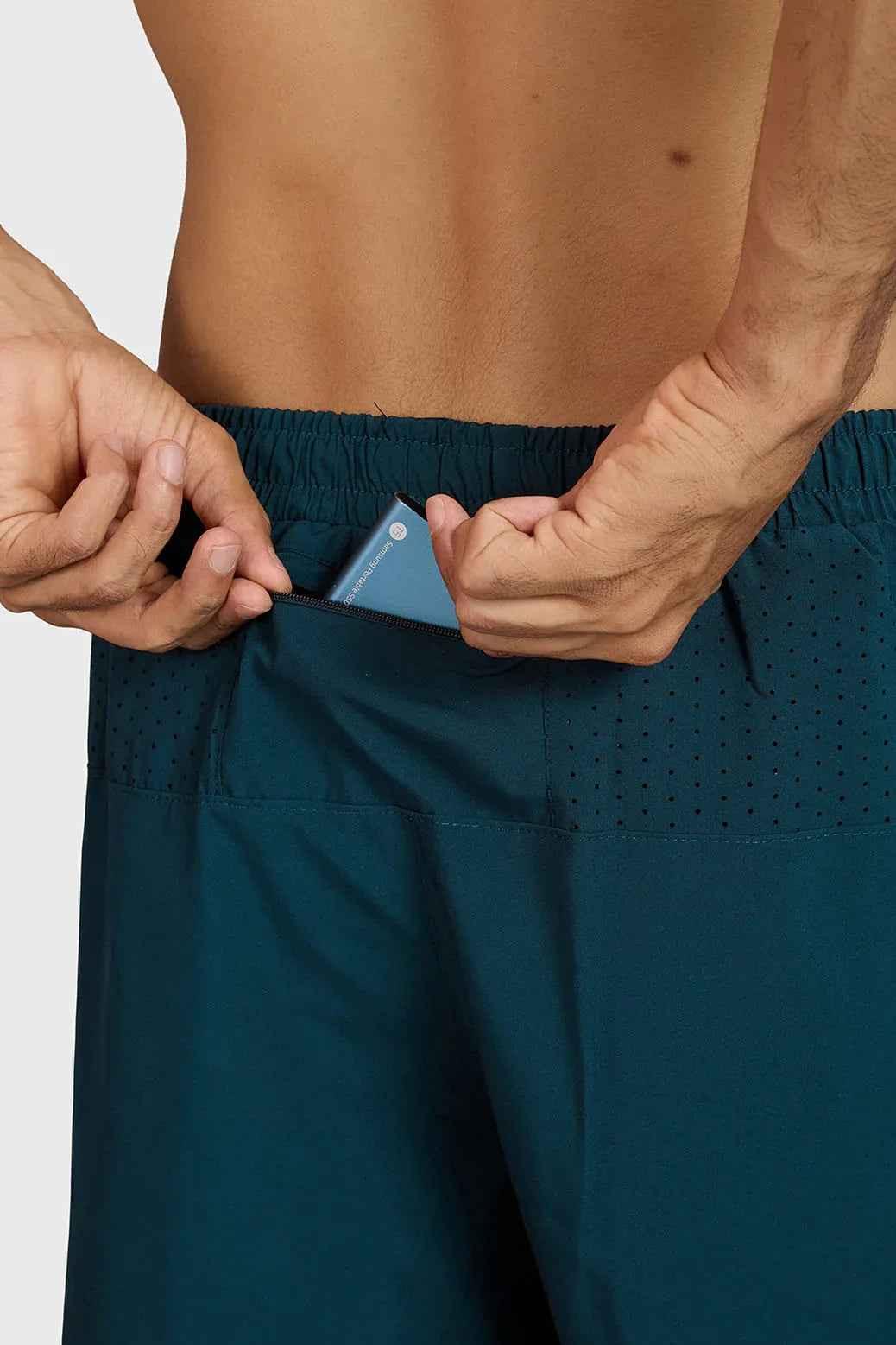 Deep green Hyper 5-inch running shorts by Fuaark Nz with lightweight fabric and athletic fit for active wear.
