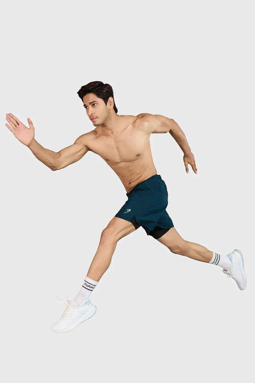 Deep green Fuaark Nz Hyper 5-inch running shorts with breathable fabric and elastic waistband for comfortable athletic wear.