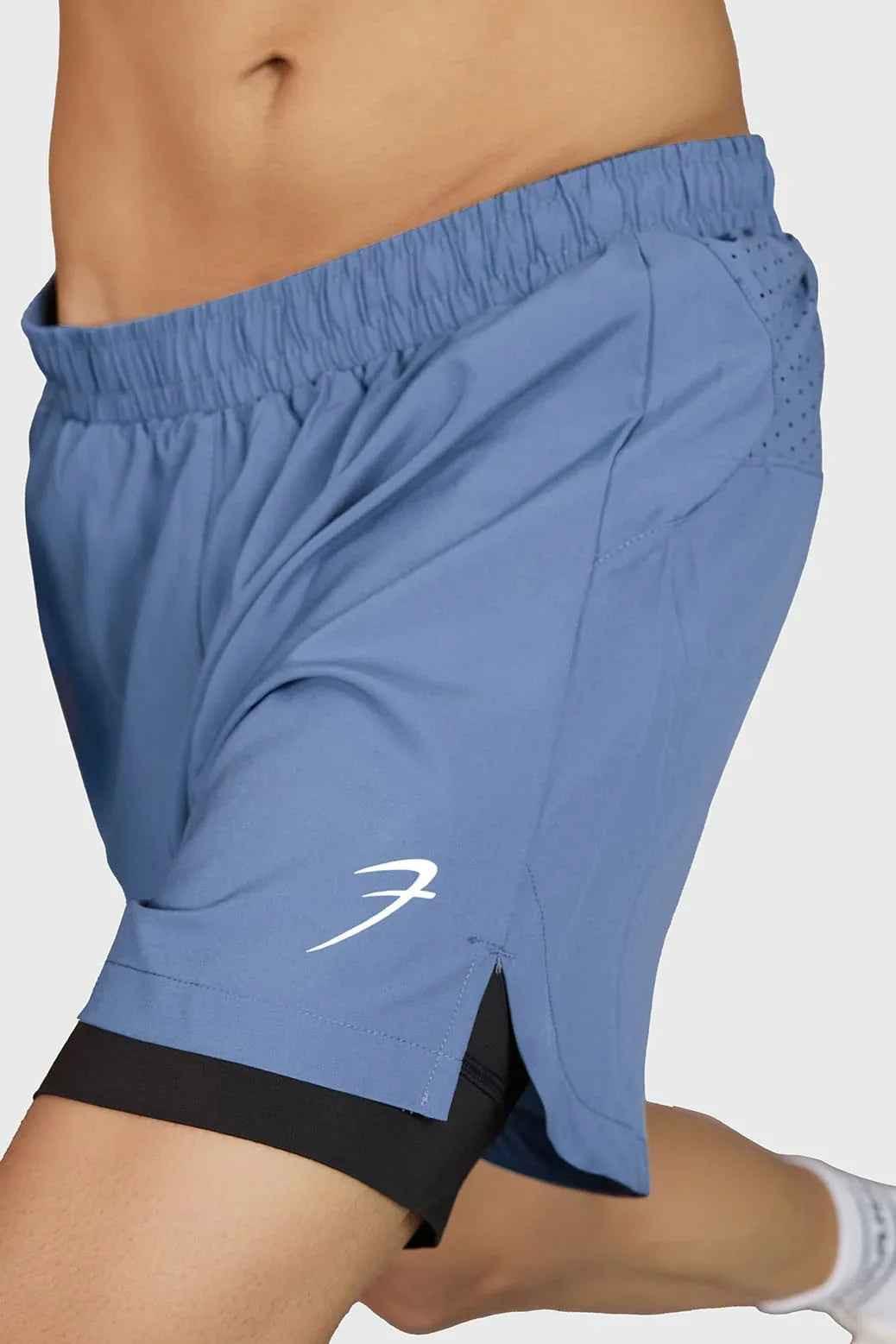 Fuaark Nz Hyper 5-inch light grey running shorts with elastic waistband and breathable fabric for active wear.