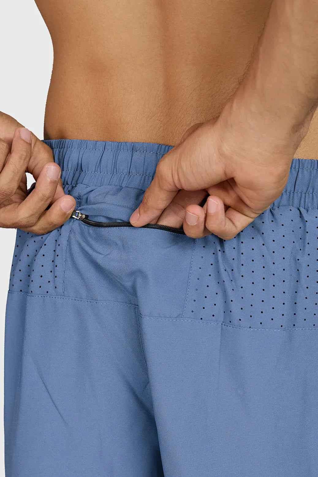 Light grey Fuaark Nz Hyper 5-inch running shorts with elastic waistband and breathable fabric for active sports.