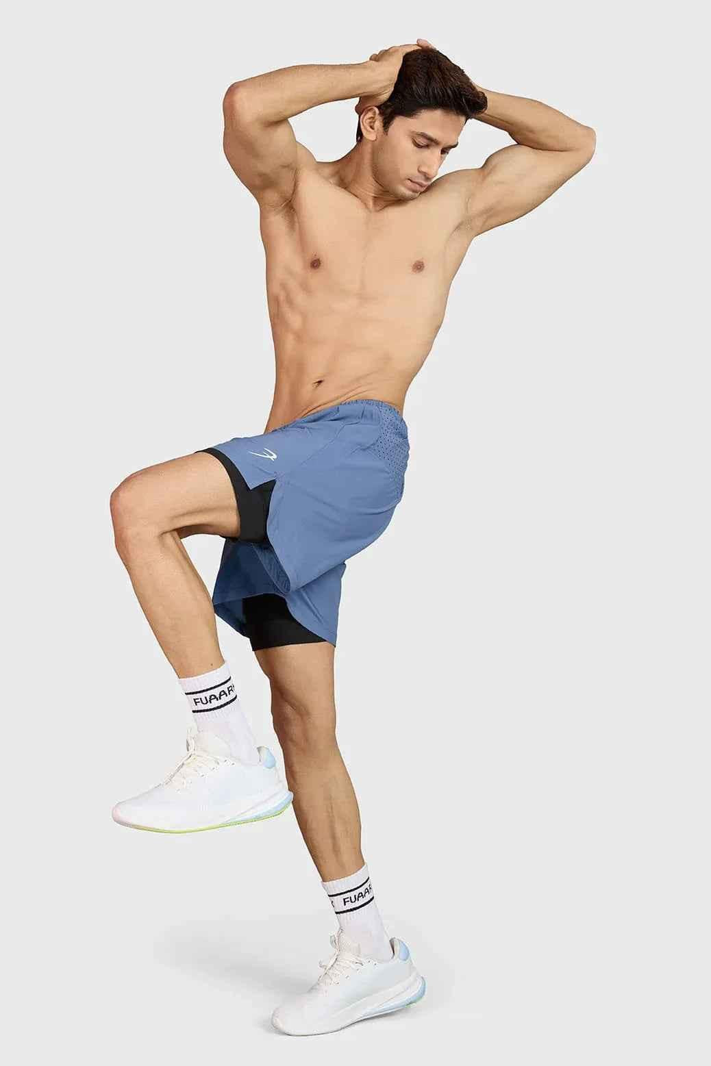 Light grey Hyper 5" running shorts by Fuaark Nz, featuring breathable fabric and athletic fit for active wear.