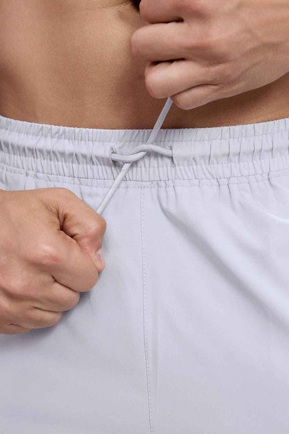 Light grey thread shorts by Fuaark NZ, designed for active lifestyles, showcasing a comfortable fit and stylish athletic apparel.