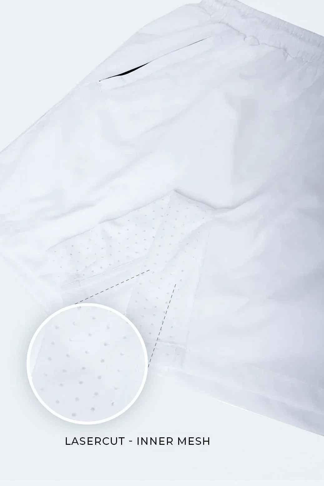 White Nova Shorts by Fuaark Nz, lightweight casual shorts with an elastic waistband and relaxed fit, shown on a model.