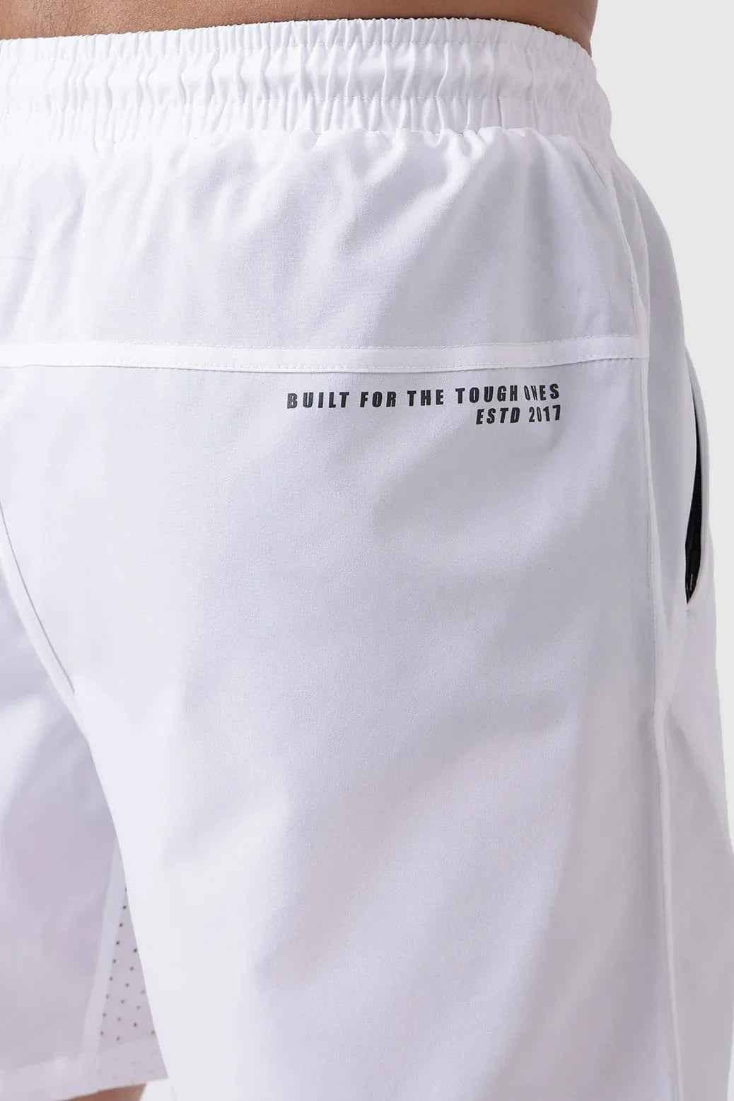 White Nova Shorts by Fuaark Nz laid flat, showing lightweight fabric and simple design perfect for casual wear.