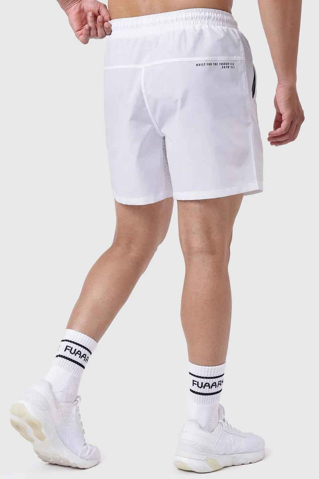 White Nova Shorts by Fuaark Nz displayed on a hanger, showcasing casual fit and clean design for comfortable everyday wear.