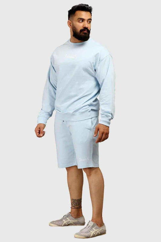 Oversized sky blue Fuaark Nz shorts with relaxed fit, soft fabric, perfect for casual comfort and stylish summer wear.