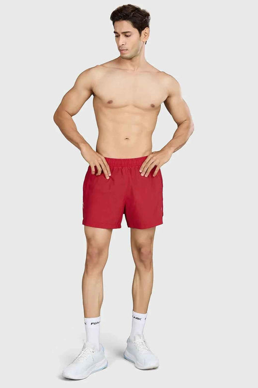 Red Pulse 4-inch running shorts by Fuaark Nz, lightweight and comfortable athleisure wear designed for active workouts.