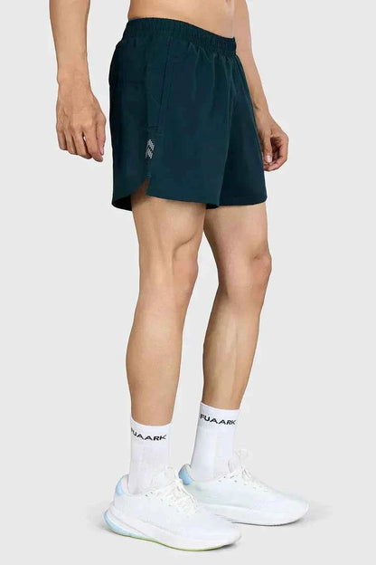 Deep green Pulse 4-inch running shorts by Fuaark NZ, lightweight athletic shorts with a comfortable fit for running.