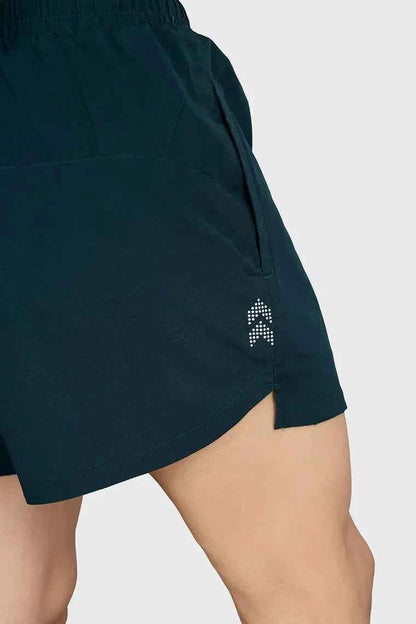 Deep green Pulse 4-inch running shorts by Fuaark Nz, lightweight athletic shorts with breathable fabric and elastic waistband.