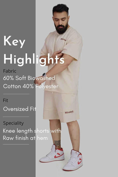 Beige raw edge oversized shorts by Fuaark Nz, featuring a relaxed fit and casual style perfect for warm weather.