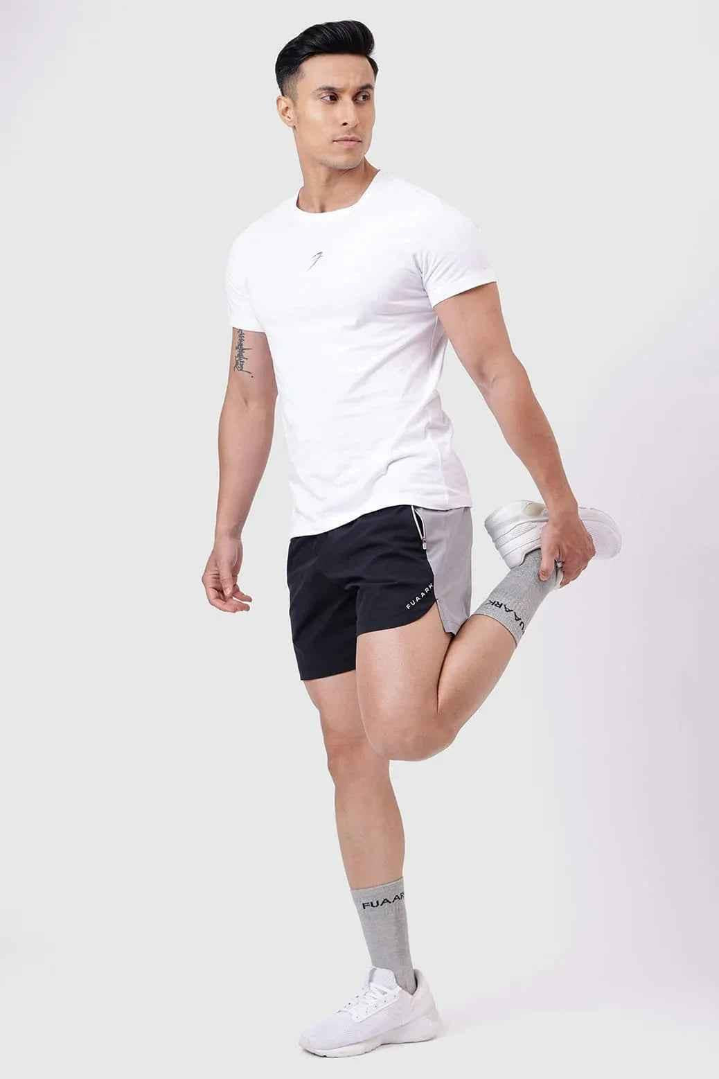 Black Snap Colourblock Shorts by Fuaark Nz showing a stylish design with colorblock panels and comfortable fit.