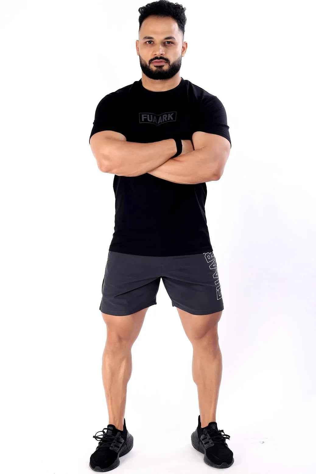 Fuaark Nz grey Studio Shorts displayed on a model, featuring a relaxed fit and casual style for comfortable wear.