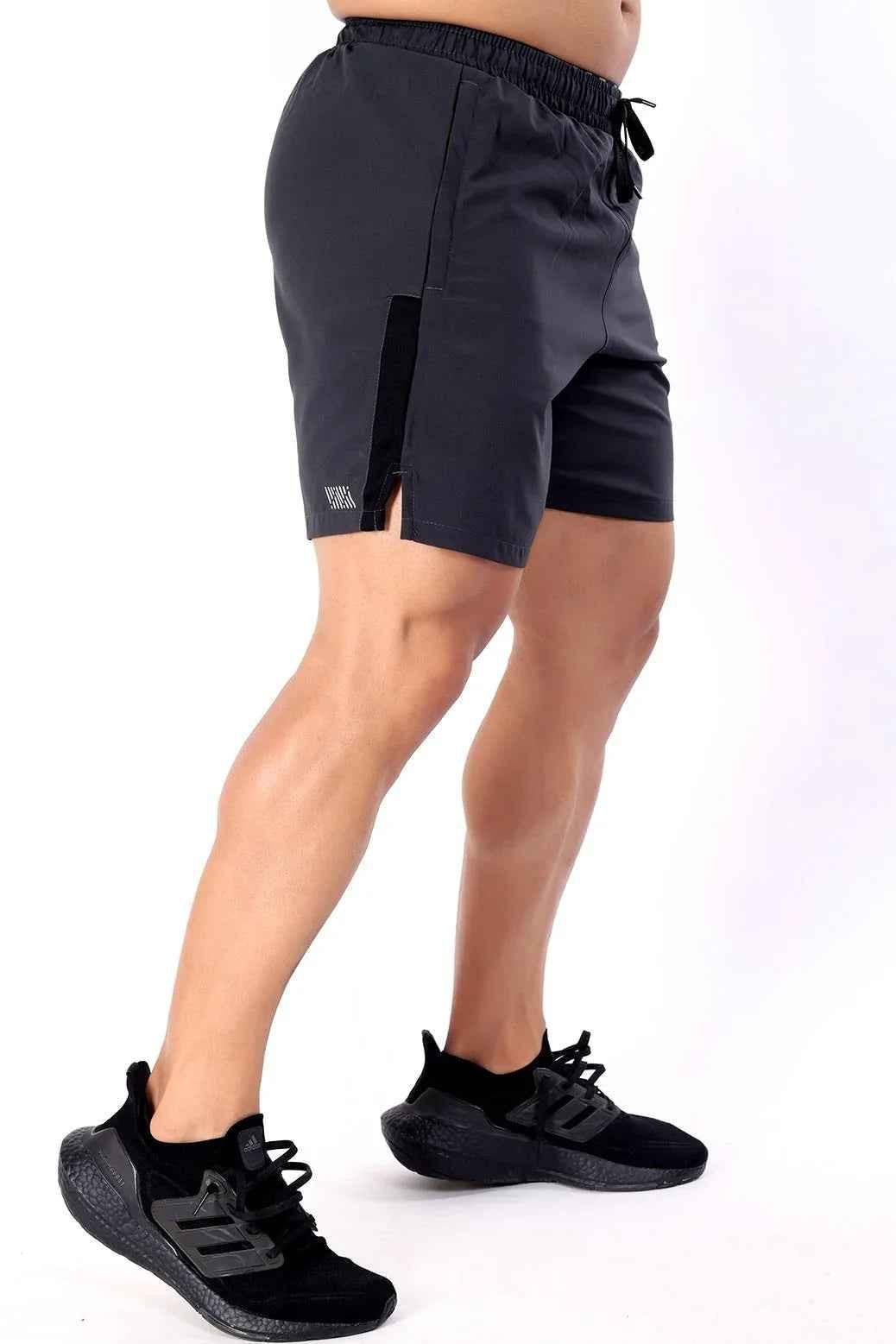 Fuaark NZ Studio Shorts in grey laid flat, showing the casual fit and soft fabric, ideal for comfortable summer wear.