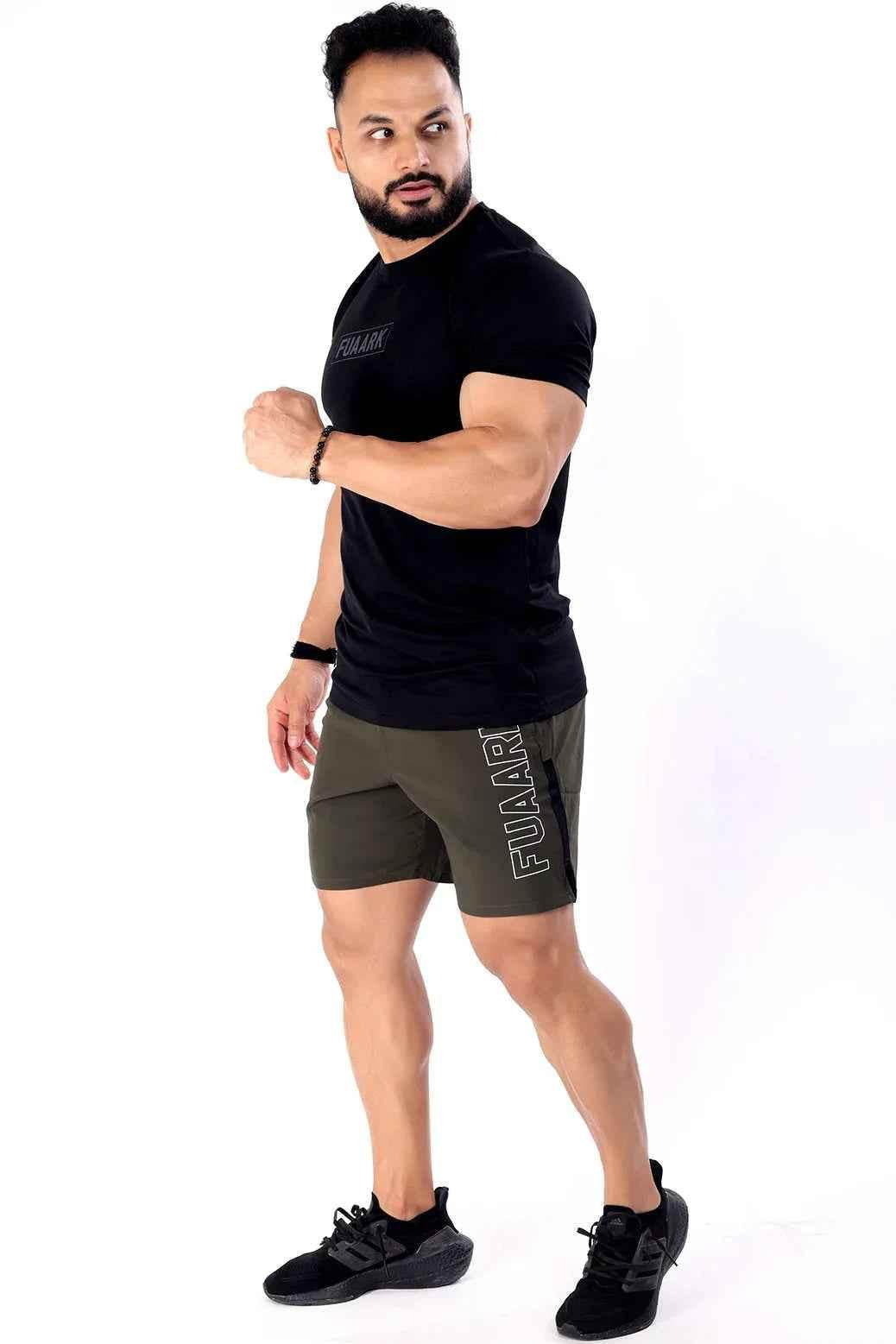 Olive green Fuaark Nz Studio Shorts displayed flat, showing their casual design and comfortable fit.