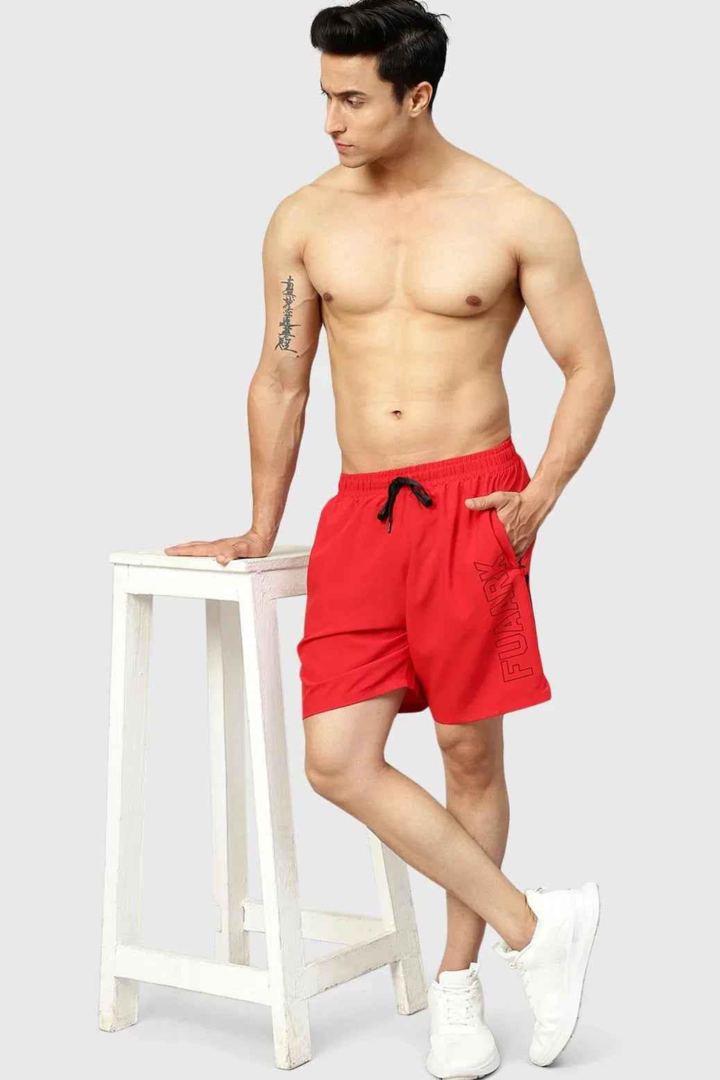 Red Studio Shorts by Fuaark Nz, featuring a stylish fit and casual design, shown in a close-up image highlighting the fabric.