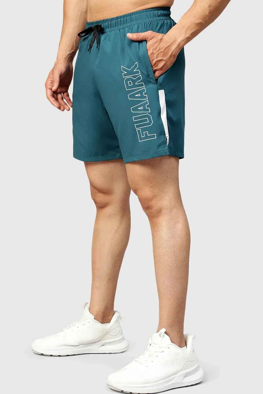 Fuaark NZ Studio Shorts in teal color, lightweight casual shorts with an elastic waistband and relaxed fit.