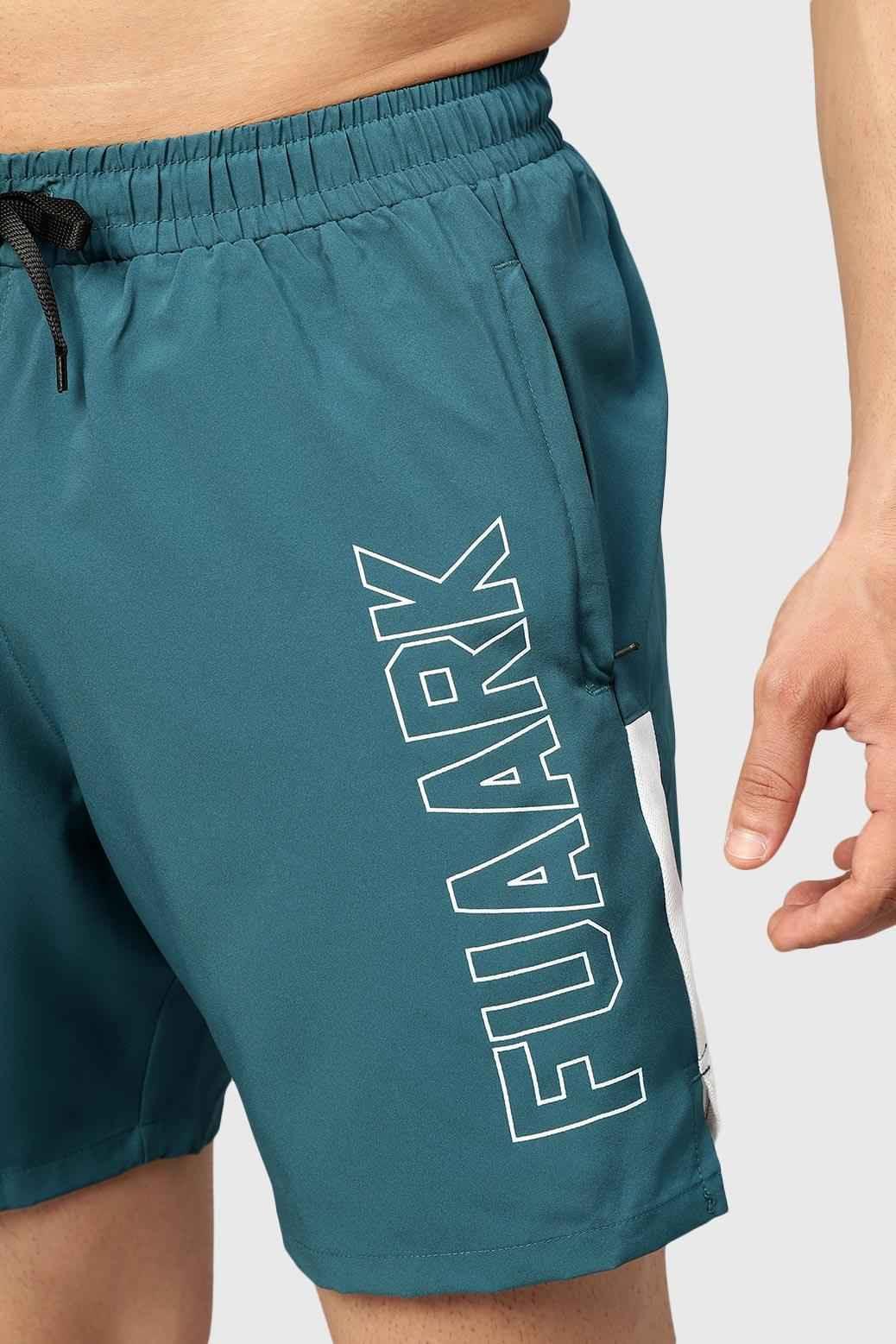 Fuaark Nz Studio Shorts in teal color, showcasing casual fit and comfortable fabric, ideal for active or relaxed wear.