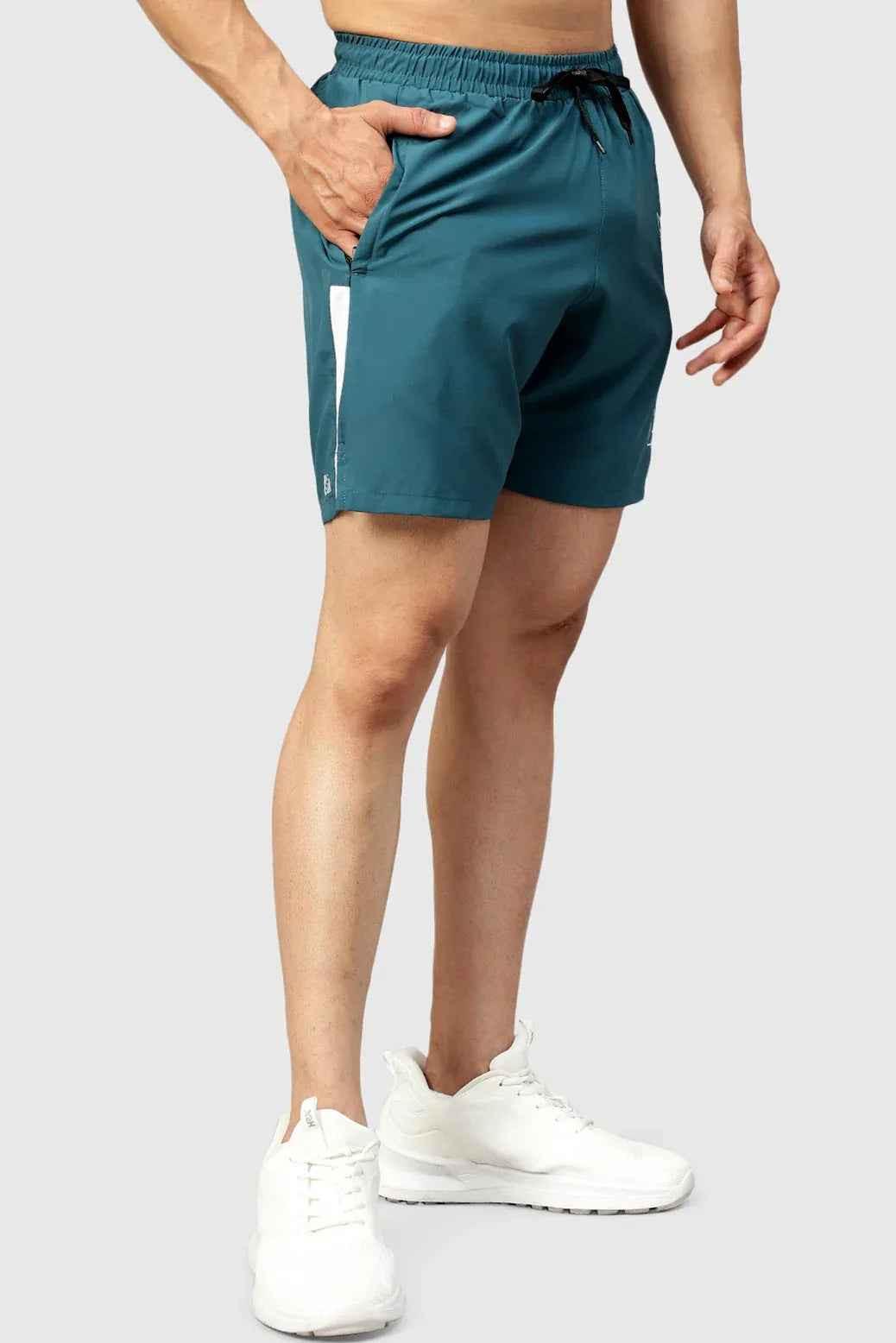 Fuaark Nz Studio Shorts in teal color, casual fit, lightweight fabric, designed for comfort and style.
