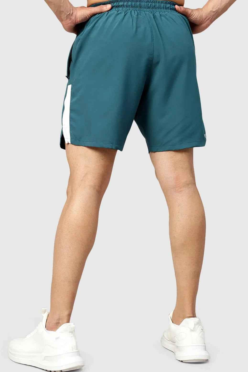 Teal Fuaark Nz Studio Shorts displayed flat with adjustable waistband and relaxed fit for casual wear.