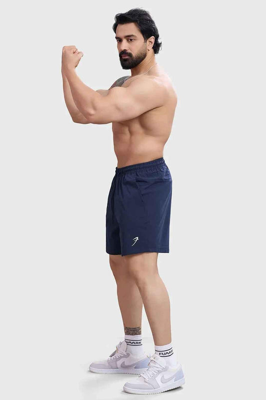 Navy Fuaark Nz Thread Shorts displayed on a model, featuring a casual fit and lightweight fabric for comfortable summer wear.