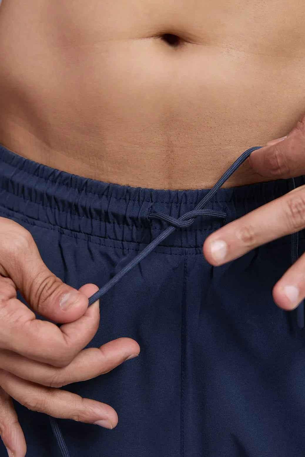 Navy Thread Shorts by Fuaark Nz, casual men's shorts with a relaxed fit and durable fabric, styled on a model.