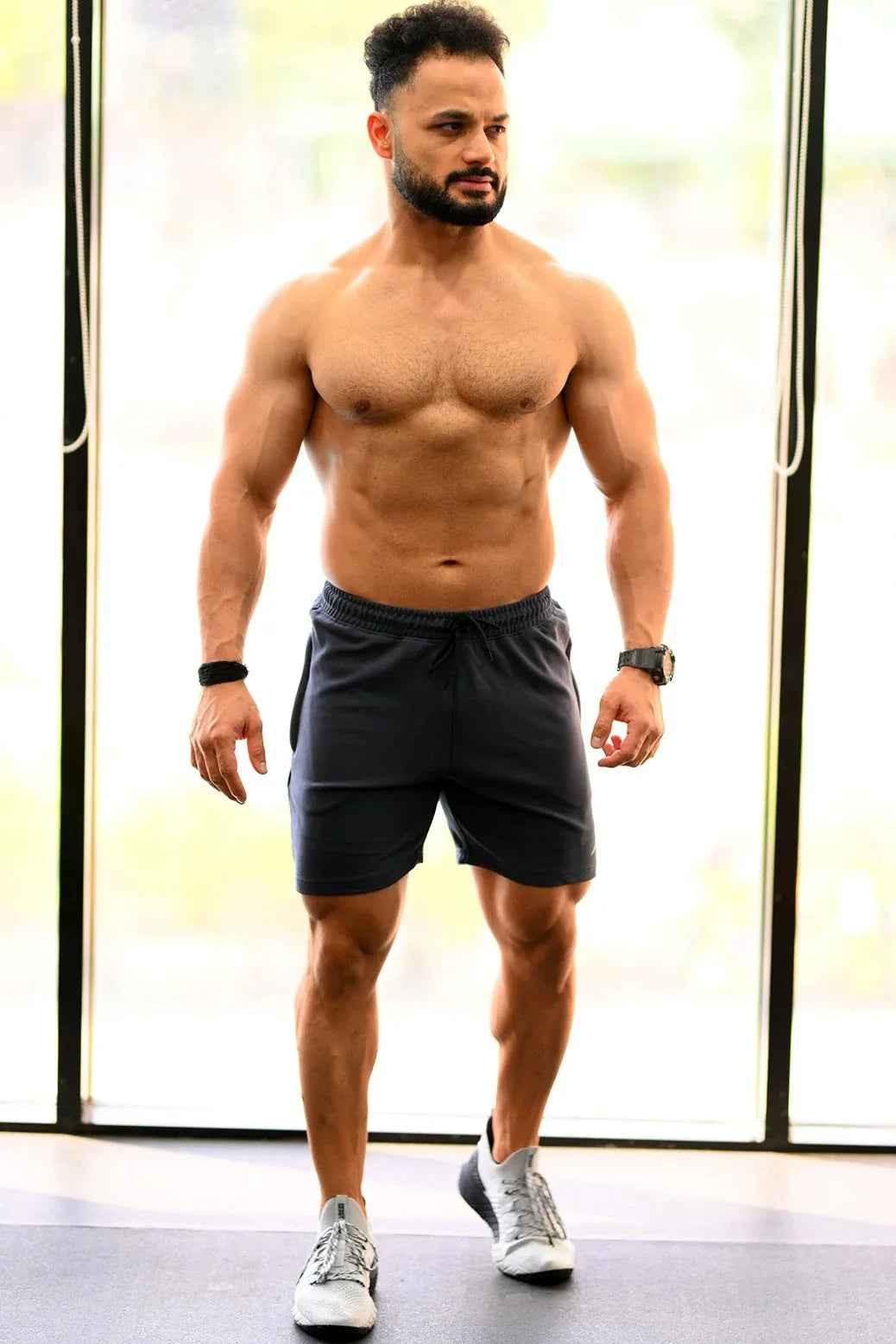 Fuaark Nz Ultra Grey Shorts for men, showcasing a comfortable fit and stylish design ideal for casual wear.