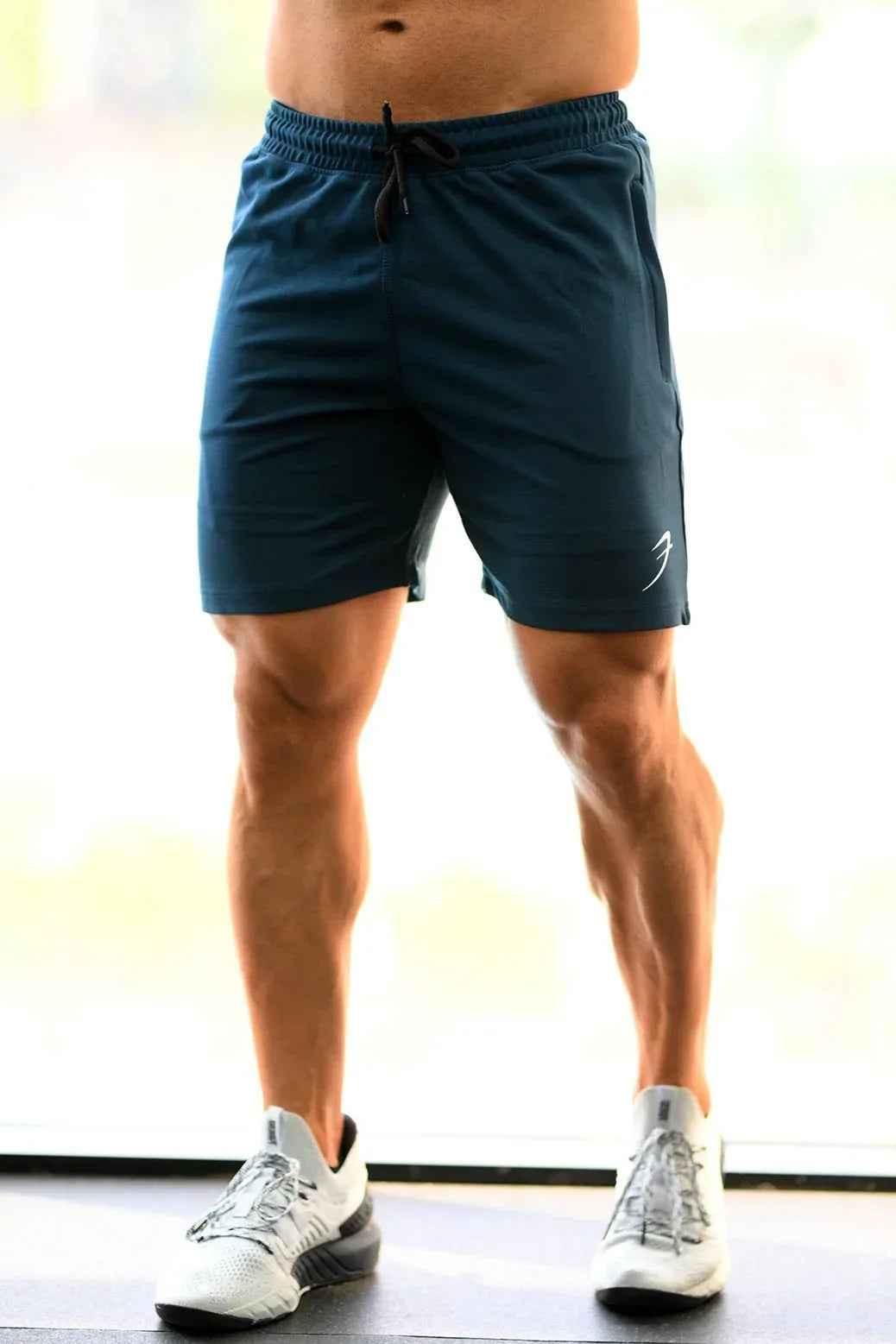 Fuaark NZ Ultra Shorts in teal, featuring a comfortable fit and stylish design, shown on a model.
