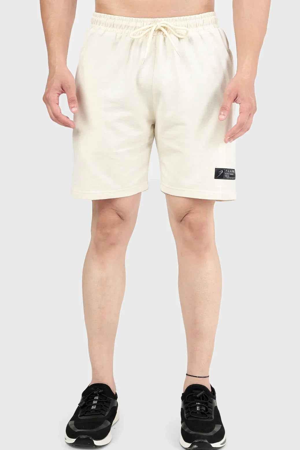 Beige Venture Shorts by Fuaark Nz displayed on model, casual fit with adjustable waistband and side pockets.