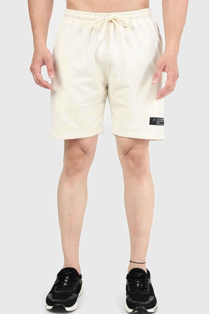 Beige Venture Shorts by Fuaark Nz displayed on model, casual fit with adjustable waistband and side pockets.