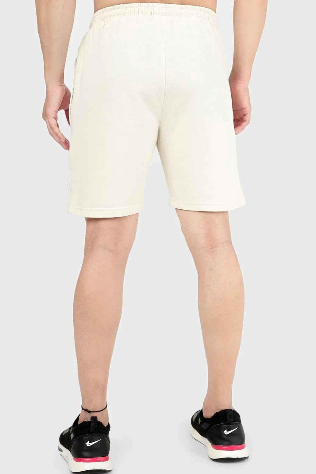 Beige Fuaark Nz Venture Shorts laid flat, showcasing casual men's shorts with a relaxed fit and lightweight fabric.