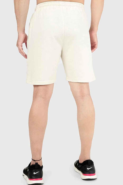 Beige Fuaark Nz Venture Shorts laid flat, showcasing casual men's shorts with a relaxed fit and lightweight fabric.