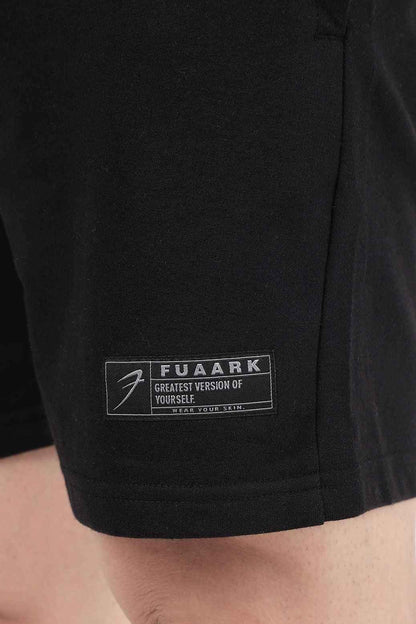 Black Venture Shorts by Fuaark Nz, casual men's shorts with a comfortable fit, shown on a model.