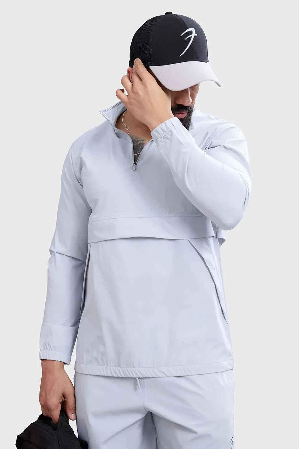 Light grey Fuaark Nz sweater with a soft, textured thread design, offering effortless style and comfort for everyday wear.