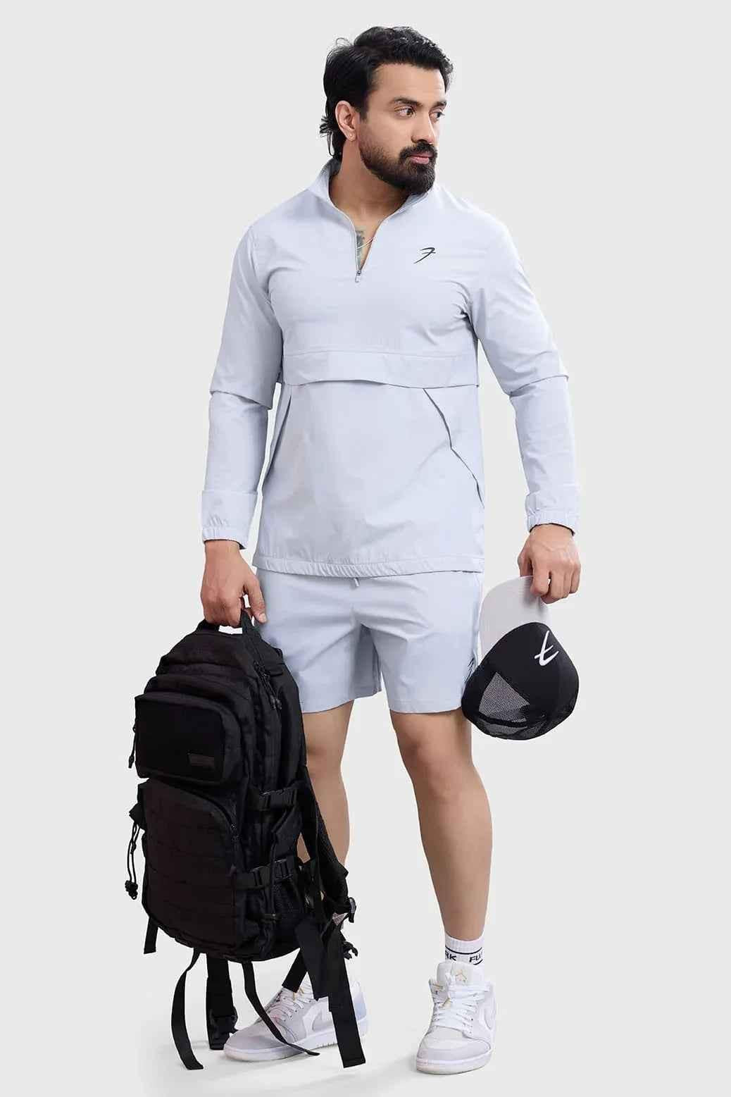 Light grey Fuaark Nz sweater with a soft, cozy knit, perfect for casual wear and versatile styling.