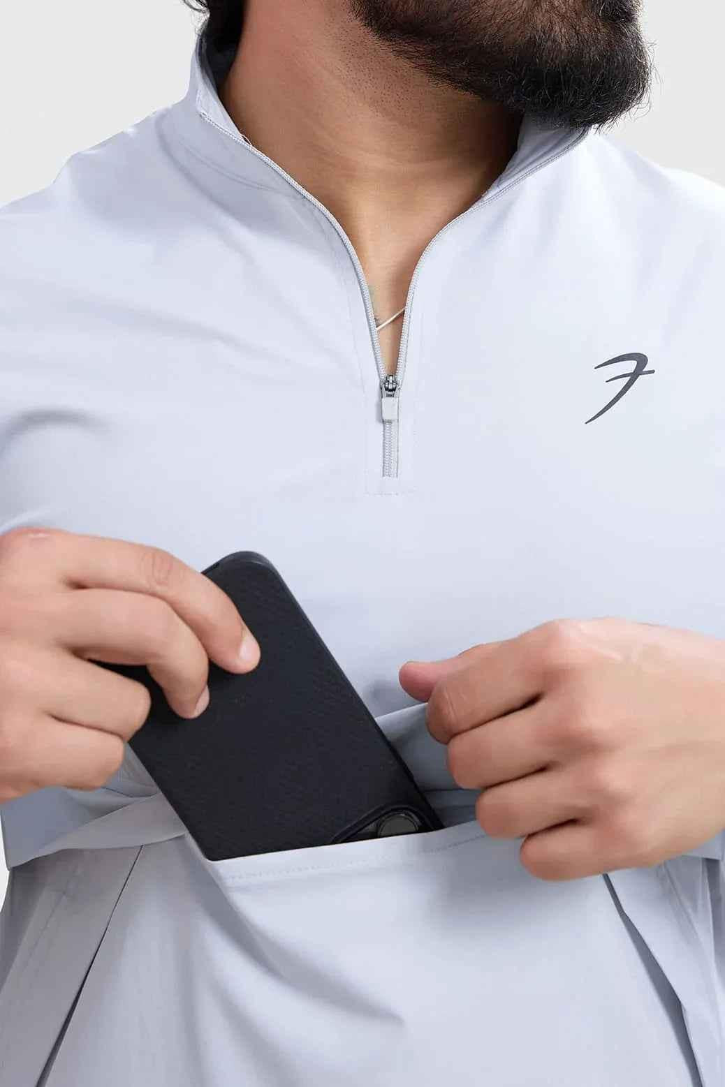 Light grey Fuaark Nz sweater with a soft, knitted thread design, offering effortless style and comfort for casual wear.