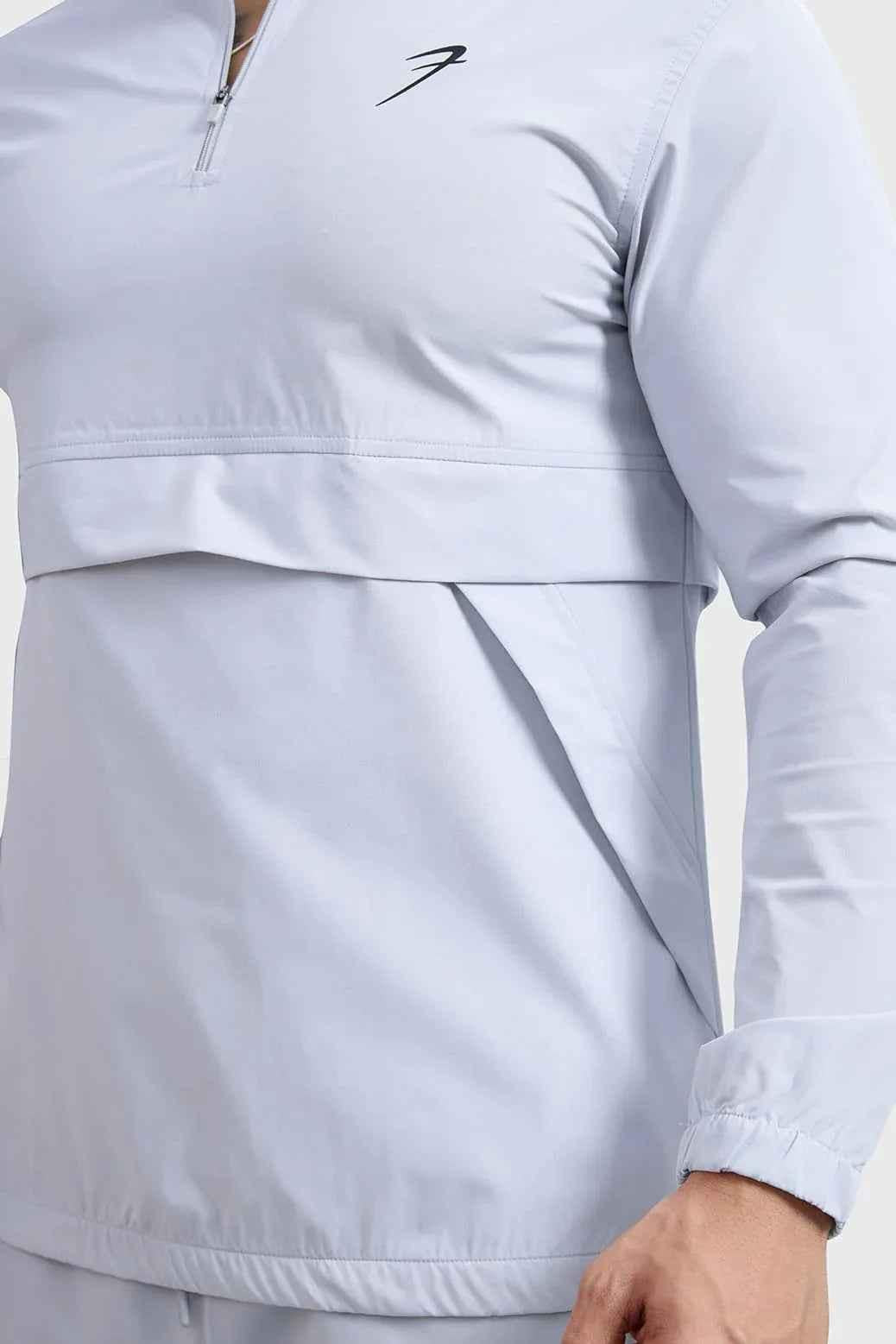 Light grey Fuaark Nz sweater with a soft, woven thread design, offering effortless style and comfort for everyday wear.