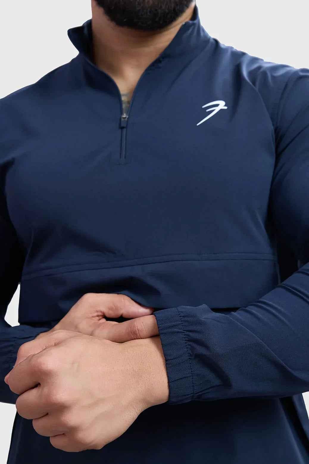 Navy blue Fuaark NZ sweater featuring a classic pullover design, soft knit fabric, and ribbed cuffs and hem.