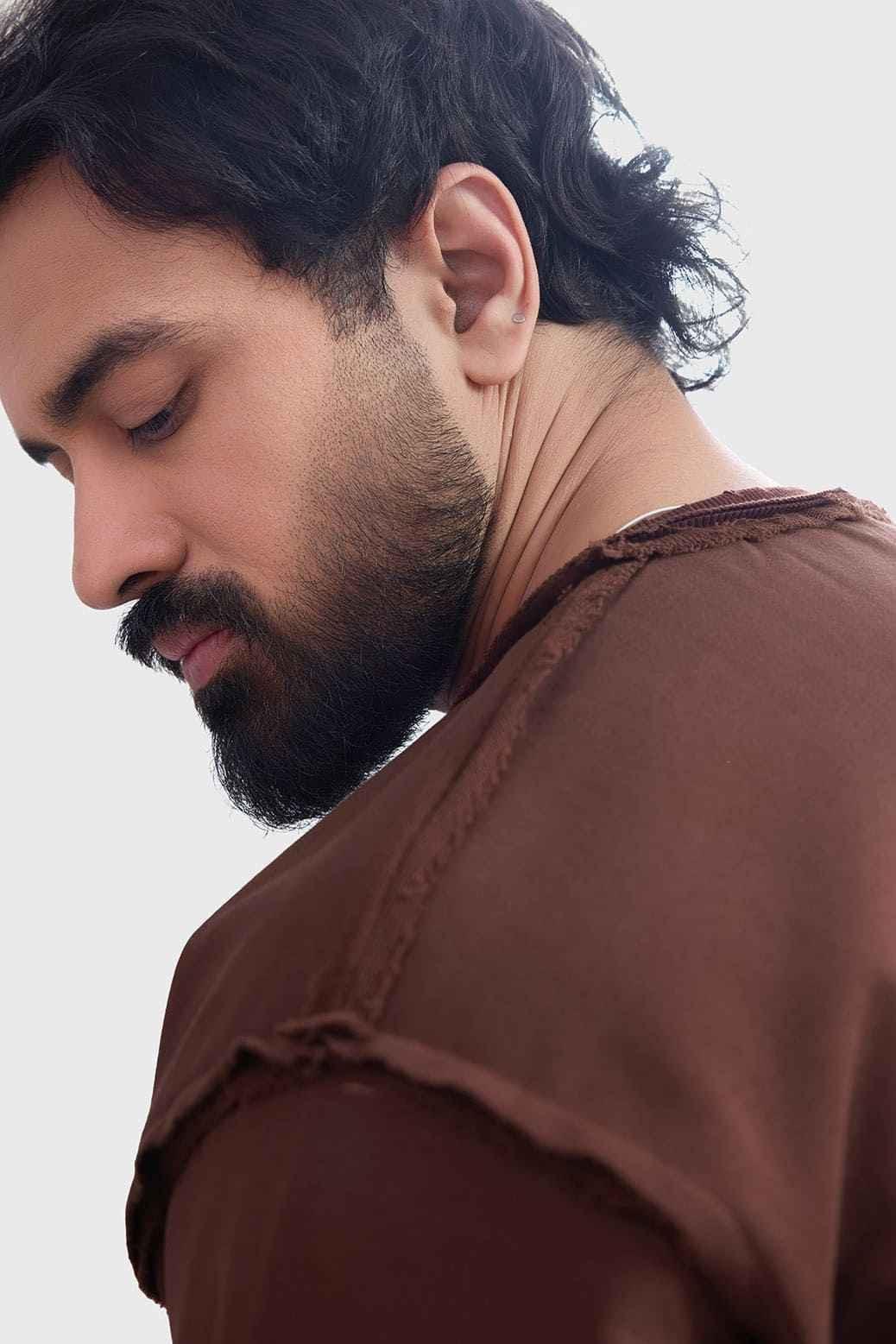 Brown Shell Raw Sweatshirt by Fuaark Nz, showcasing a cozy, casual sweatshirt with a relaxed fit and soft fabric.