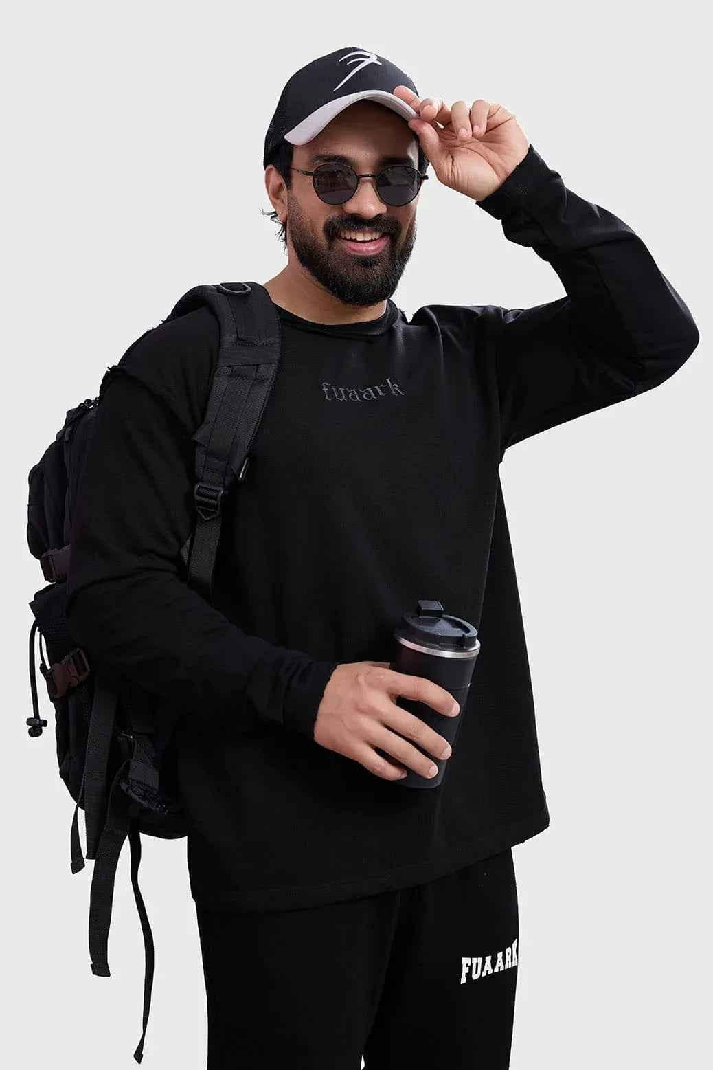 Black Shell Raw Sweatshirt by Fuaark Nz featuring a casual fit and soft fabric, displayed on a neutral background.