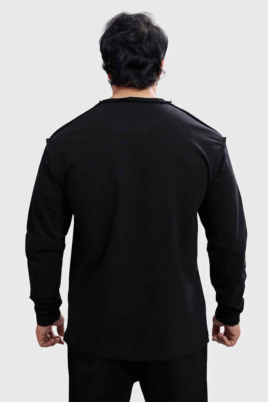 Black Shell Raw Sweatshirt by Fuaark Nz, showcasing a casual fit with soft fabric and minimalist style.