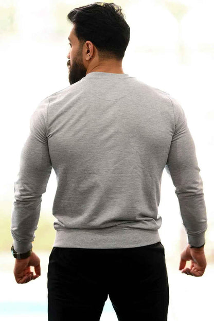 Light grey Fuaark Nz fall sweatshirt with a cozy, relaxed fit, perfect for casual autumn wear.
