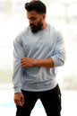 Sky blue oversized sweatshirt by Fuaark Nz, featuring a cozy fit and casual style, perfect for comfortable everyday wear.