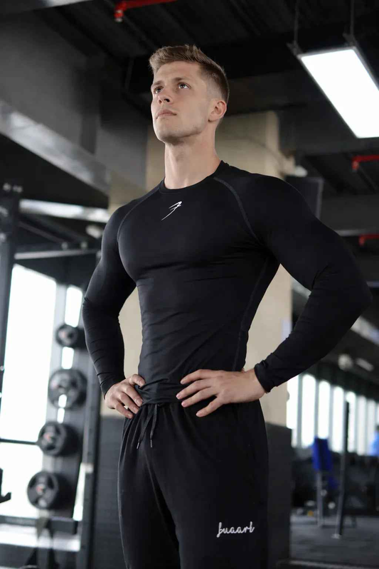 Black compression full-sleeves T-shirt by Fuaark Nz, shown laid flat with smooth fabric and fitted design.