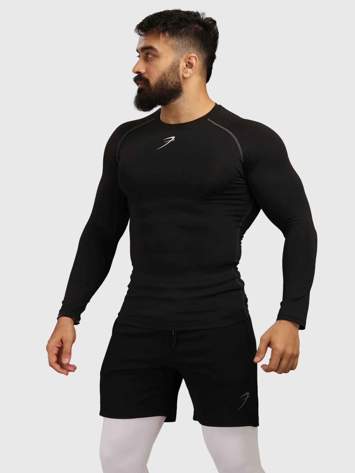 Black Fuaark Nz compression fullsleeves T-shirt, close-up view showing fitted design and smooth fabric.