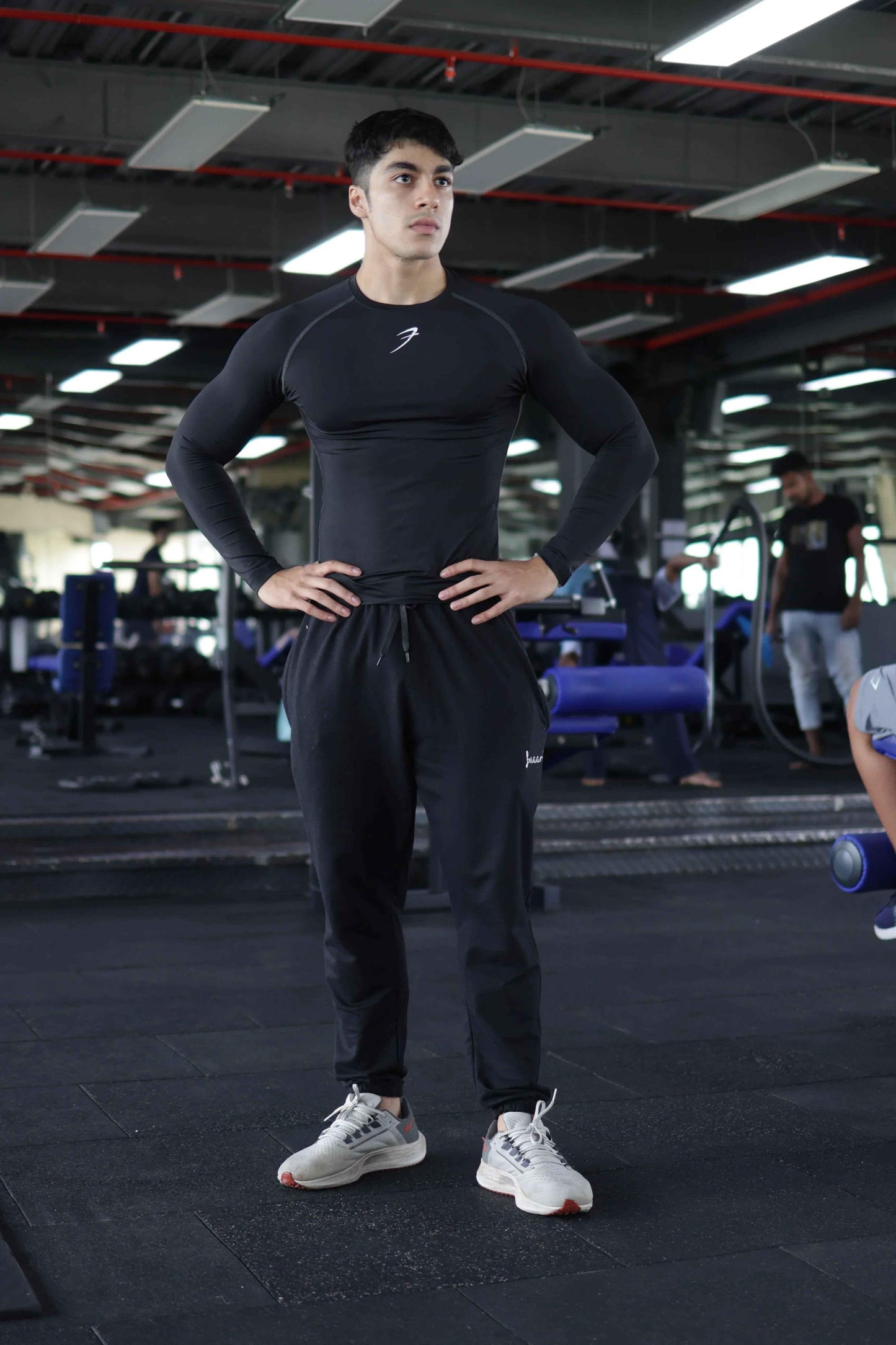 Black Fuaark Nz compression fullsleeves T-shirt showing a snug fit and smooth fabric, designed for athletic performance.